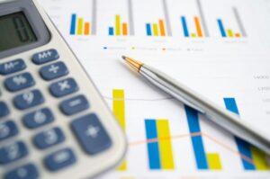 Calculator on graph paper. Finance development, Banking Account, Statistics, Investment